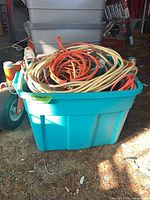 Tote filled with assorted extension cords