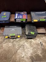 All five tool cases and box on shelving