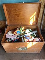 Open chest showing assorted toys inside