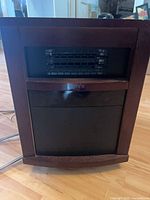 Front view of Omni Max heater showing grille and cabinet