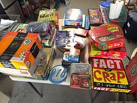Overall view of assorted board games and card decks on table