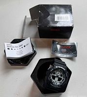 Watch in tin with manuals and box