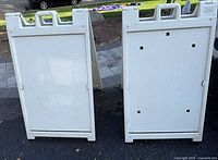 Front view of both plastic sandwich boards standing open