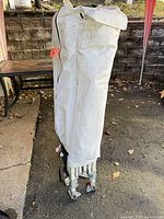 Collapsed frame inside storage cover