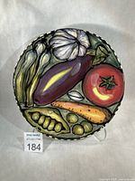 Front view of platter showing full vegetable design