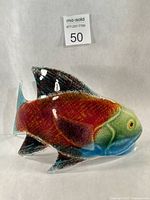Full view of fused glass salmon sculpture left side