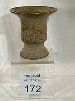 Front view showing shape, glaze, decoration