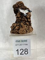 Front view showing seagull and burl base