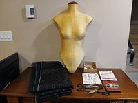 Overall lot with mannequin, fabric, sewing items
