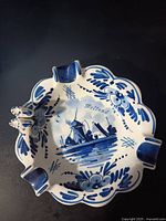 Top view of Boma Delft ashtray showing windmill scene and 3D clog rests