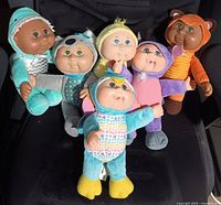 All six 10-inch Cabbage Patch Kids Cuties dolls displayed together