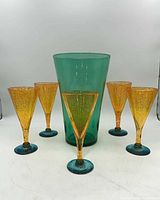 Full group showing green vase and five orange/blue stemware