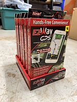 Six boxed EZ Way GPS holders on display stand