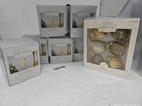 Group of six LED sphere boxes plus ornament set box