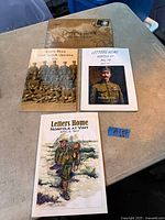 All four WWI Letters Home books laid out