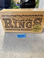 Front of sealed box with title and promotional sticker