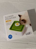 Sealed box showing Catit Flower Fountain Mini image and branding