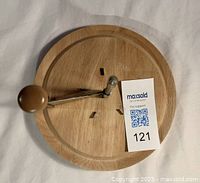 Top view of Boska cheese curler on wood base