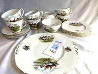 Complete tea set laid out showing pattern, counts and scale