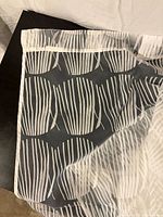 Close-up of pattern and top hem showing tab construction