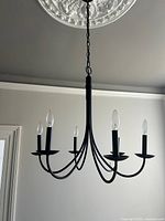 Chandelier installed, showing finish and form