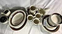 Overview of entire 37-piece Bistro stoneware set