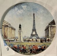 Front view of plate showing Eiffel Tower scene