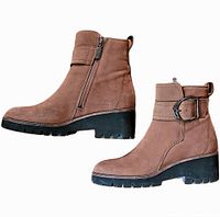 Side profile of both boots showing leather, buckle, zipper, sole