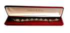 Bracelet displayed in original red velvet presentation box marked Camrose & Kross