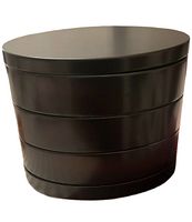 Closed black oval jewelry box