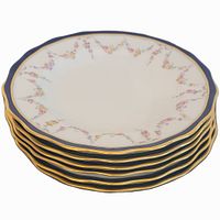Stack of six cobalt blue and gold rimmed Royal Crown Derby plates