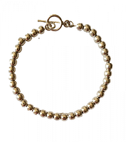 Full view of round bead sterling silver bracelet in circular form