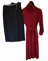 Skirt and dress hanging side by side