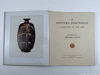 Front spread showing title page and colour plate