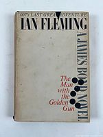 Front cover with jacket showing title, author, 007 reference