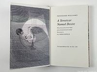 Open book showing illustration and title page