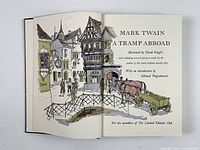 Open book showing illustrated title page confirming Limited Editions Club edition