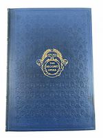 Front cover showing blue embossed cloth with gilt device