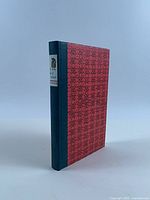 Front and spine view of cloth-bound book