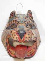 Front view showing leopard features, paint details, wire hanger