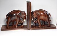 Front view of both hardwood elephant bookends