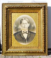 Full view of framed portrait showing frame design and proportions