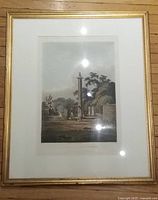 Full view of framed print showing mat and gilt frame