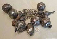 overall view of amulet with attached charms