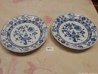 Pair of Meissen Blue Onion dinner plates top view