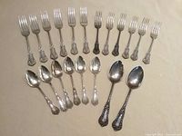 All 20 pieces laid out: 6 dinner forks, 6 salad forks, 6 teaspoons, 2 dessert spoons