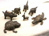 Seven brass animal figures grouped