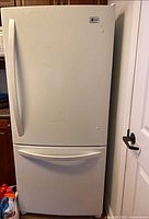 Closed view showing full exterior and dent