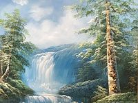 Close view of central waterfall and surrounding trees