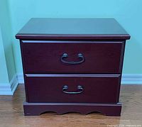 Front view showing drawers and hardware
